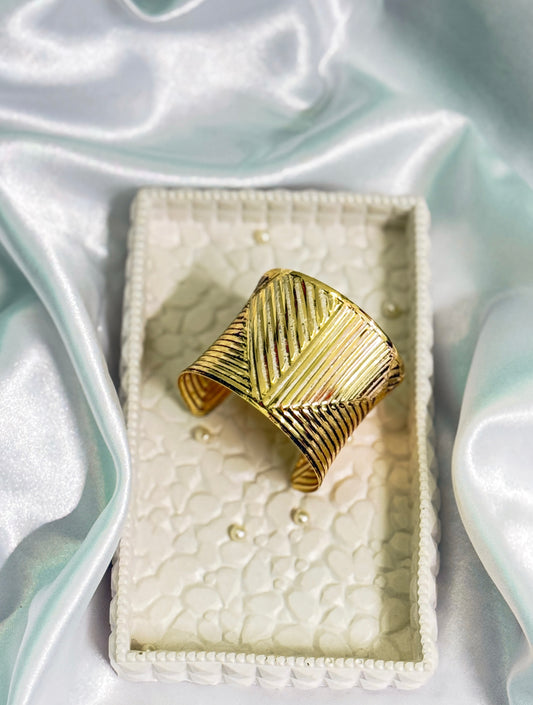 Golden handcuff bracelet